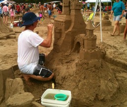 Elaborate Sand Castle being carved at Hanalei Sand Festival